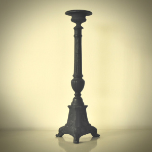 A Decorative Cast-Iron Candlestick